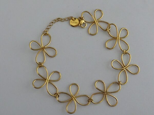 Goudkleurige bloemen armband met sluiting