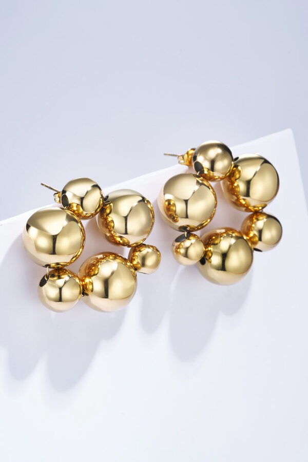 Gebubbelde oorbellen - goudkleurig