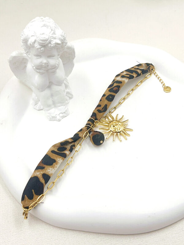 Gepanterde stoffen-stainless steel armband